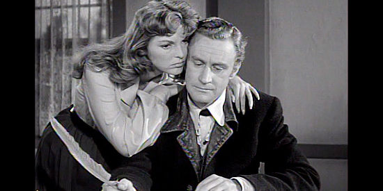 Julie London as Shelby Ransom and Ronald Howard as Clay Allen in Drango (1957)