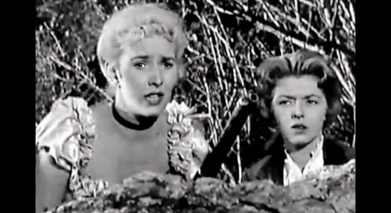 Kathy Marlowe as 'Faro' Kitty Brewster, trying to hold off a band of Comanche wihth Merry Anders as Ellen Downs in Five Bold Women (1959)