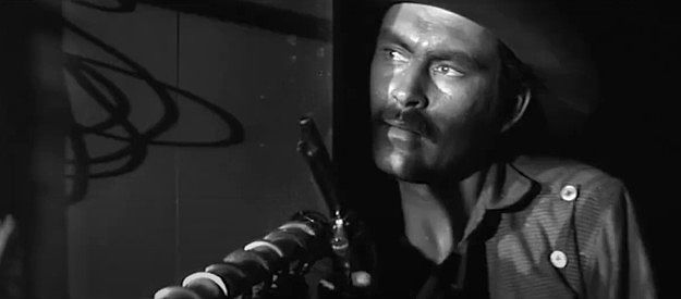 Ken Scott as Paul Finney, leader of the outlaw gang Daniel Hardy was part of in The Fiend Who Walked the West (1958)