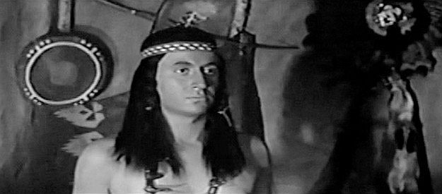 Larry Solway as Chief Little Crow, longtime acquaintance of Jim Hewson, considering his peace proposal in Flaming Frontier (1958)