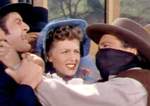 Hugh O'Brian as Hank Purvis, Barbara Britton as Elizabeth Ainsworth and Richard Conte as Jan Morrell in The Raiders (1952)