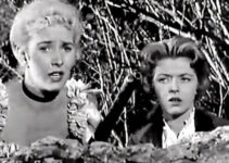 Kathy Marlowe as 'Faro' Kitty Brewster, trying to hold off a band of Comanche wihth Merry Anders as Ellen Downs in Five Bold Women (1959)