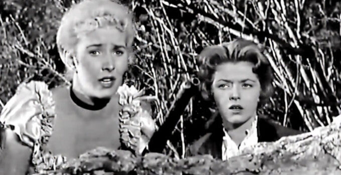 Kathy Marlowe as 'Faro' Kitty Brewster, trying to hold off a band of Comanche wihth Merry Anders as Ellen Downs in Five Bold Women (1959)