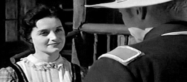 Paisley Maxwell as Felice Carver, the half-breed wife of Col. Carver, who's fallen out of favor with her husband because of her Native American blood in Flaming Frontier (1958)
