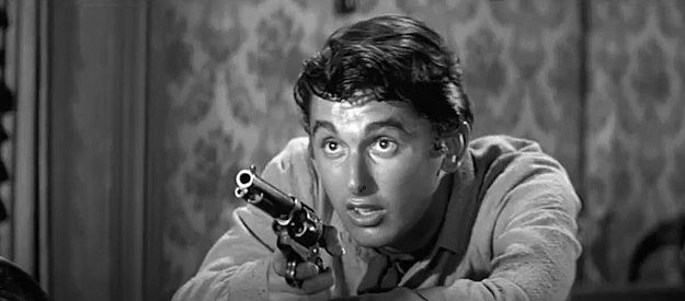 Robert Evans as Felix Griffin, his violence triggered yet again in The Fiend Who Walked the West (1958)