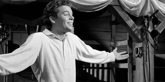 Russ Tamblyn as Eric Doolittle, about to put on a dancing exhibition in The Fastest Gun Alive (1956)