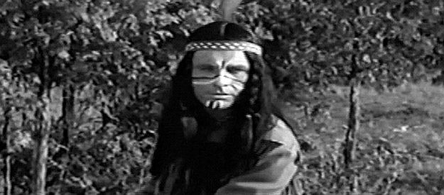 Shane Rimmer as Running Bear, the Sioux Capt. Jim Hewson helps to earn a parlay with Chief Little Crow in Flaming Frontier (1958)