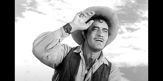 Gilbert Roland as Juan Herrera, the 'squatter' who's long loved Vance Jeffords in The Furies (1950)