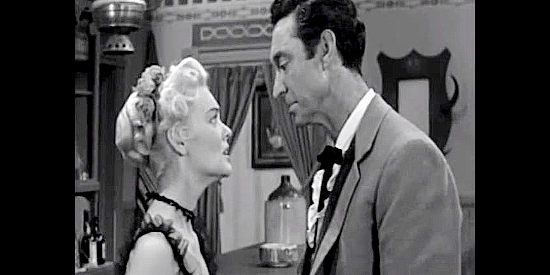 James Griffith as Cash Skelton trying to convince Kate Durand (Lyn Thomas) to leave town with him in Frontier Gun (1958)