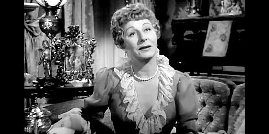 Judith Anderson as Flo Burnett, T.C. Jeffords' new lady love, causing problems in The Furies (1950)