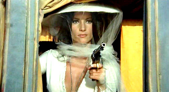Nicoletta Machiavelli as Lulu shows off her colt in Garter Colt (1968)