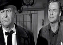 John Agar as JIm Crayle, explaining to his dad (Barton MacLane) why his new job as sheriff of Honcho is so important in Frontier Gun (1958)