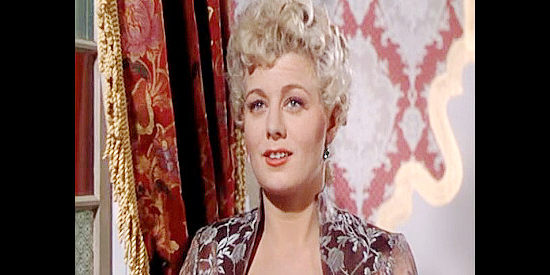 Shelley Winters as Frenchie Fontaine, opening a gambling house in Bottleneck in her effort to avenge her father's death in Frenchie (1950)