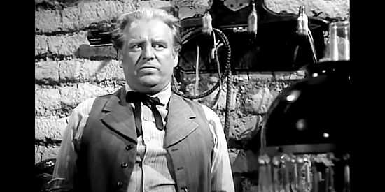 Wallace Ford as Scotty Hyslip, T.C.'s longtime assistant and bookkeeper for the ranch in The Furies (1950)