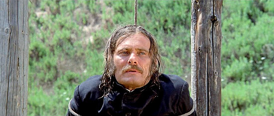 William Berger as Padre Tony Lanthony in The Executioner of God (1974)