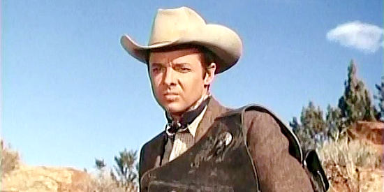 Audie Murphy as Logan Keliher, finding himself on the trail of a former friend turned killer and outlaw in Bullet for a Badman (1964)