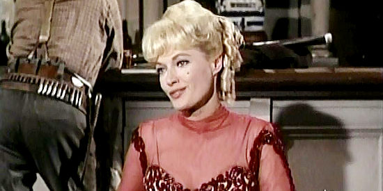 Cece Whitney as Goldie, the saloon owner and old friend Logan Keliher turns to when he needs cash in Bullet for a Badman (1964)