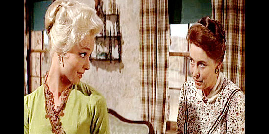 Diane McBain as Laura Frelief, expressing concern to Mrs. Prescott (Mary Patton) that another kitty might be after her mouse in A Distant Trumpet (1964)