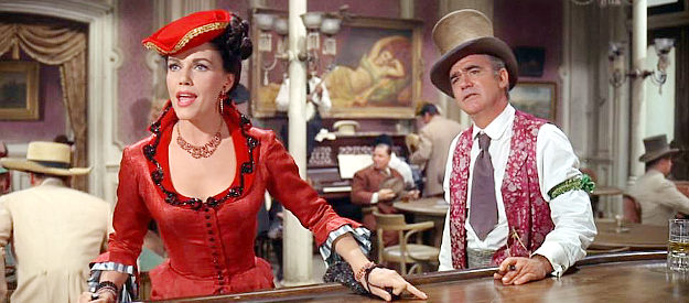 Elizabeth Allen as Guinevere Plantagenet as the saloon girl Wyatt Earp doesn't remember with Mayor Dog Kelly (Judson Pratt) in Cheyenne Autumn (1964)