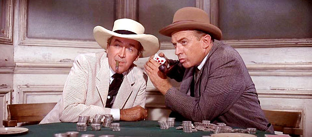 James Stewart as Wyatt Earp and Arthur Kennedy as Doc Holliday, wondering why the deck has just 51 cards in Cheyenne Autumn (1964)