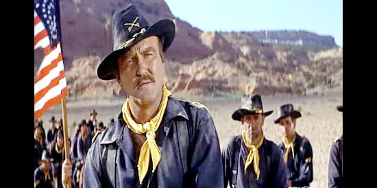 Lane Bradford as Maj. Miller, assigned the task of getting the surrendering Apache to Florida in A Distant Trumpet (1964)