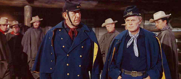 Mike Mazurki as 1st Sergeant and Richard Widmark as Capt. Tom Archer ponder what to do about the plight at Fort Robinson in Cheyenne Autumn (1964)