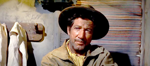 Richard Boone as Jim Lassiter, leading an expedition to recover stolen rifles in Rio Conchos (1964)