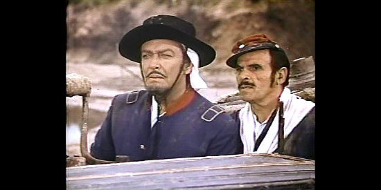 Robert Taylor as Capt. Martin with Marc Lawrence as Sgt. Barril in Savage Pampas (1966)