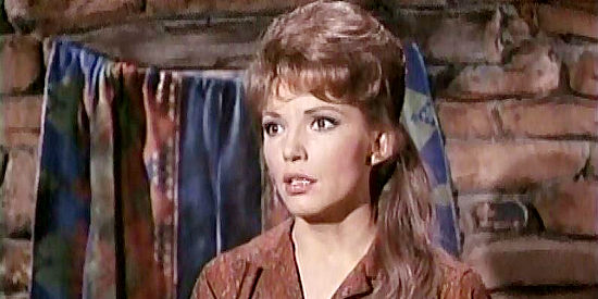 Ruta Lee as Lottie, fearful for her future now that her bank robbing man has been killed in Bullet for a Badman (1964)