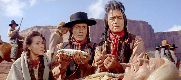 Spanish Woman (Dolores del Rio), Little Wolf (Ricardo Montalban) and Dull Knife (Gilbert Roland) look on as their chief passes in Cheyenne Autumn (1964)