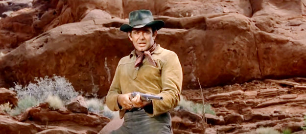 Stuart Whitman as Capt. Haven, reinforcing who's in charge in Rio Conchos (1964)