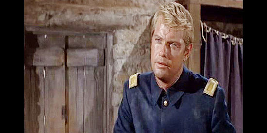 Troy Donahue as Lt. Matt Hazard, a new officer devoted to duty but torn between two women in A Distant Trumpet (1964)