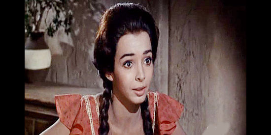 Ana Martin as Anisa Domingo, asking for one more day to find her parents' killers in Return of the Gunfighter (1967)