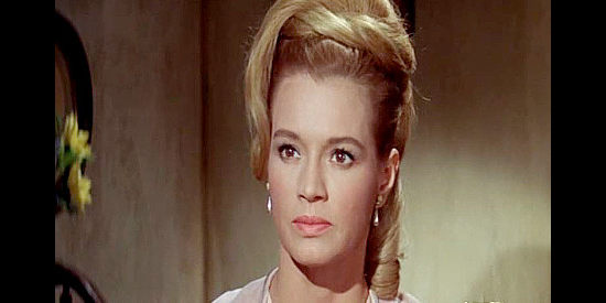 Angie Dickinson as Lisa Denton, a saloon owner in love with a marshal in danger in The Last Challenge (1967)