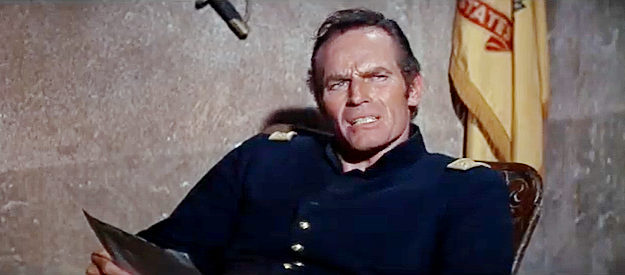 Charlton Heston as Maj. Dundee, reviewing his plan to use Confederate prisoners to fight Apaches in Major Dundee (1965)