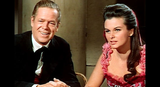 Dan Duryea as WIllie Duggan and Audrey Dalton as Carole Ridgeway, dreaming of a fresh start in a new place in The Bounty Killer (1965)