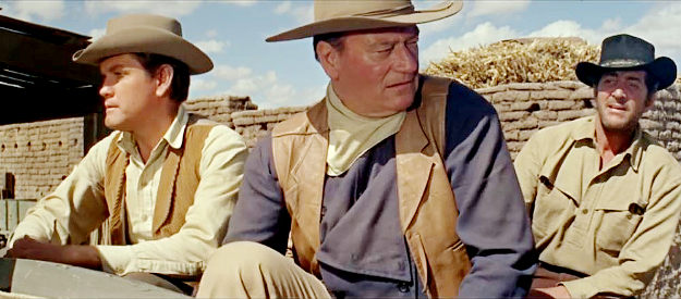 Earl Holliman as Matt Elder, John Wayne as John Elder and Deam Martin as Tom Elder, off to face justice in The Sons of Katie Elder (1965)