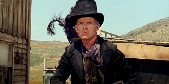 Elisha Cook Jr. as Hanson, an undertaker ready to risk his life over a horse in Welcome to Hard Times (1967)