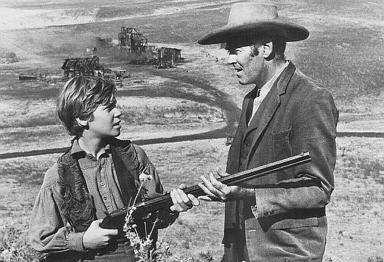 Henry Fonda as Will Blue offers Jimmy Fee (Michael Shea) fatherly advice in Welcome to Hard Times (1967)