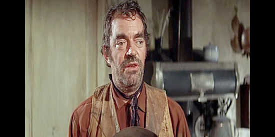 Jack Elam as drifter Ernest Scarnes, in need of money and trying to blackmail Lisa Denton in The Last Challenge (1967)