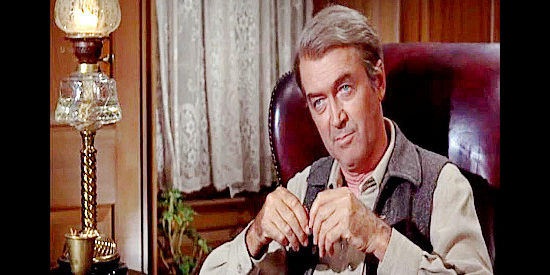 James Stewart as Charlie Anderson, quizzing Jennie's beau Sam about their relationship in Shenandoah (1965)