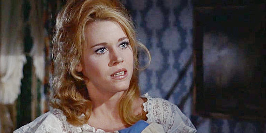 Jane Fonda as Cat Ballou, challenging Clay and Jed to help her even the score with Tim Strawn in Cat Ballou (1965)
