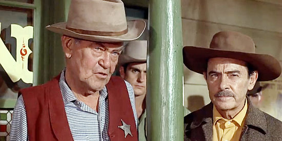 Jay C. Flippen as Sheriff Cardigan, listening to Cat's demands for justice after the death of her dad in Cat Ballou (1965)