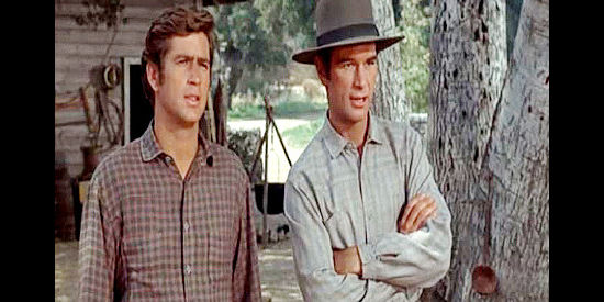 Jim McMullan as John Anderson and Charles Robinson as his brother Nathan, two of Charlie's sons in Shenandoah (1965)