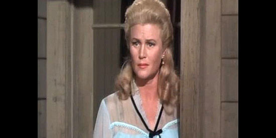 Joan Caulfield as Dakota 'Lil McCoy, the woman with two Gatlings buried on her ranch in Red Tomahawk (1967)