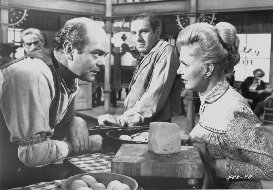 Joanne Woodward as Mary with bartender Sam Rhine (James Berwick) in A Big Hand for the Little Lady (1966)