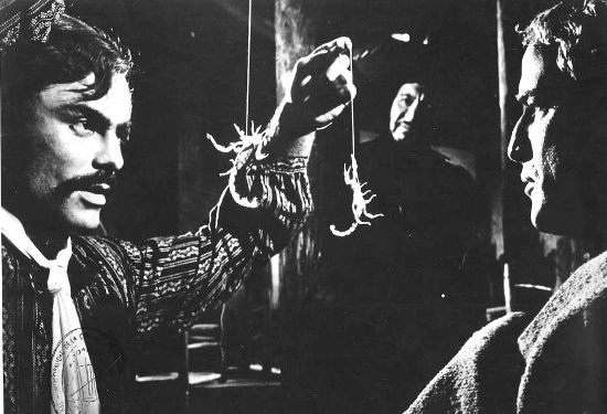 John Saxon as Chuy Medina and Marlon Brando as Matt Fletcher prepare the scorpions in The Appaloosa (1966)