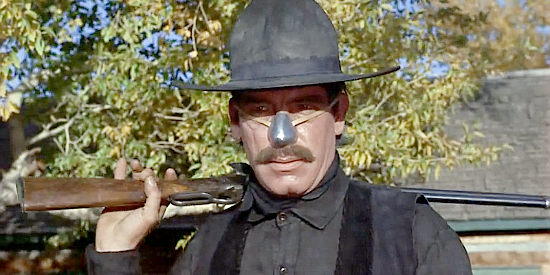 Lee Marvin as Tim Strawn, the killer hired to get rid of Cat Ballou's dad so his ranch can be seized in Cat Ballou (1965)