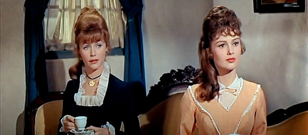 Lee Remick as Cora Massingale and Pamela Tiffin as Louise Gearhart, leaders of the temperance movement in The Hallelujah Trail (1965)