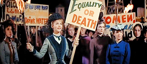 Lee Remick as Cora Massingale, leading a temperance rally at the fort in The Hallelujah Trail (1965)